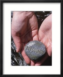 Person Holding Rock with the Word Blessings