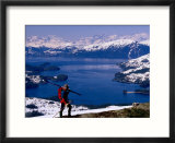 Cross Country Skier with Lake and Mountains in Background