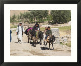 Aimaq People Walking and Riding Donkeys Entering Village  Between Chakhcharan and Jam  Afghanistan