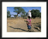 Woman Carrying Sack on Her Head  Ogol Village  Sangha  Dogon Area  Mali  Africa
