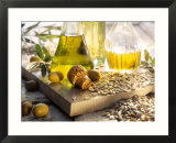 Various Oils in Carafes  Olives  Sunflower Seeds