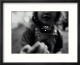 A Young Girl Reaches Out for a Firefly