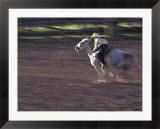 Cowgirl Rides Horse in Barrel Race Rodeo Competition  Big Timber  Montana  USA