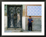 Boy Standing Near Door of Historic House  Baghdad  Iraq