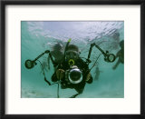 Photographer with Camera Underwater with Diving Moken Tribesmen