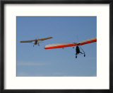 Hang Glider Being Towed Aloft by an Ultralight Aircraft