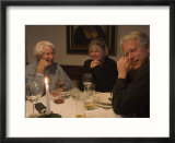 A Family Sits Around the Dinner Table at a Restaurant  Fraueninsel  Chiemsee  Bavaria  Germany