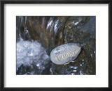 Rock with the Word Imagine in Rushing Water