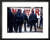 Police Face Protestors Demonstrating against the War in Iraq