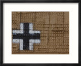 The Detailed Mesh Pattern on a Military Tank Painted Beige with a Black and White Cross