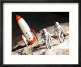 Model Astronauts Standing by Rocket on the Moon
