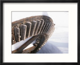 Rusty Tractor Wheel in the Snow