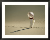 Lady with Parasol Standing in Sand Dunes and Casting a Shadow