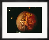 Jack-O-Lantern with an Ornate Carved Decoration of a Witch