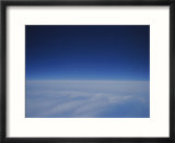 A View of a Blanket of Clouds Taken from Inside an Airplane