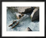 Raftsmen on a twin pontoon cataraft tackle Oygaing River rapids