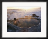 A hiker enjoys a dip in a hot springs in Long Valley
