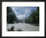 Water sprays splash rafters on the Talkeetna canyon rapids