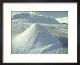 Piles of salt harvested from the sea resemble snow drifts