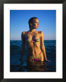 Young Woman Wearing Swimsuit on Beach in Water