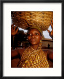 Woman Wearing Gold Fabric Dress and Carrying Basket  Kabile  Brong-Ahafo Region  Ghana