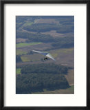Hang-Glider Soars Over the Countryside