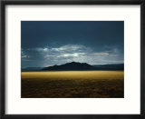 The Setting Sun Permeates Rain Clouds to Brighten Black Rock Desert  Nevada