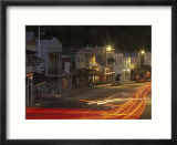 Car Lights at Night in the Gold Rush Town of Angels Camp  California
