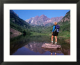 Hiker Stands on a Rockoverlooking Maroon Bells  Aspen  Colorado  USA