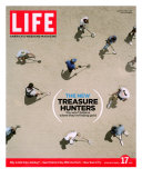 Treasure Hunters with Metal Detectors Looking for Loot on a California Beach  March 17  2006