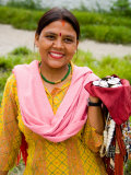 Woman with Sari Dress Selling Items at Laxmi Narayan Temple  New Delhi  India