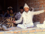 Worker Refining Wool for Rugs and Sweaters in Factory  Kathmandu  Nepal
