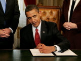 President Barack Obama Signs His First Act as President in the President's Room  January 20  2009
