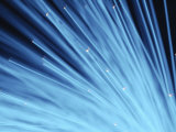 Bright Blue Fiber Optic Wires Against Black Background