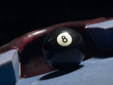 8 Ball by Corner Pocket of Billiard Table