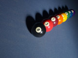 Line of Billiard Balls on Blue Felt Pool Table