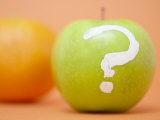Green Apple with a Question Mark Painted on It