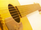 Close-Up of Strings on Wooden Guitar