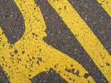 Close-Up of Bright Yellow Writing on Pavement  Switzerland
