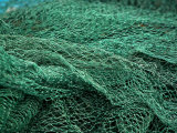 Pile of Used and Weathered Green Netting