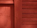 Cropped View of a Red Wall and Door