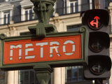 Sign for Metro with Traffic Signal Light in Paris  France