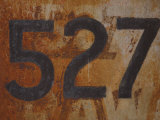 Number 527 Painted on Rusty Metal