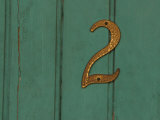 House Number 2 on a Green Wall
