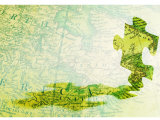 Puzzle Piece Superimposed on Antique Map