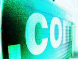 Internet Com Text Projected on Green Wall
