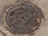 Weathered Water Manhole Cover