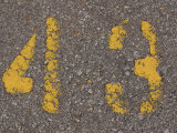 Yellow  Worn 43 Painted onto Pavement