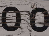 Zeros on Old Wooden Sign