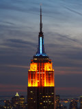 Top of the Empire State Building Illuminated at Night in New York City  New York